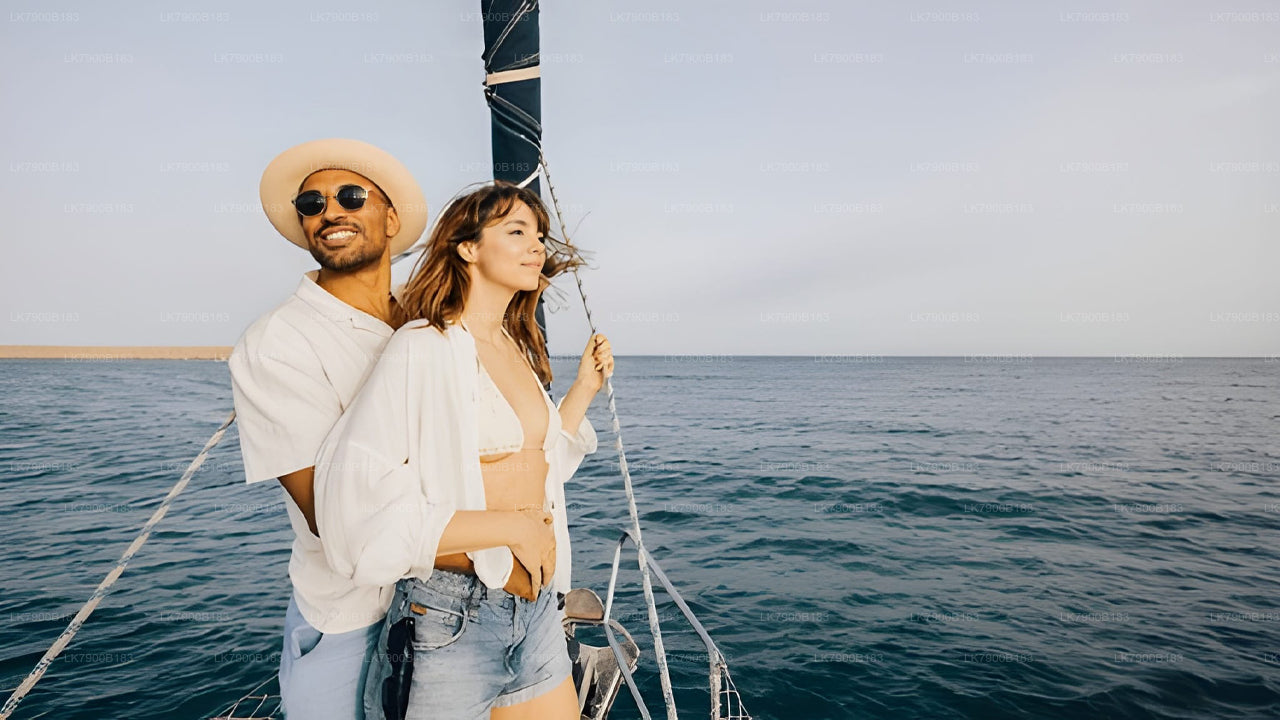Couple on a sailboat in the ocean